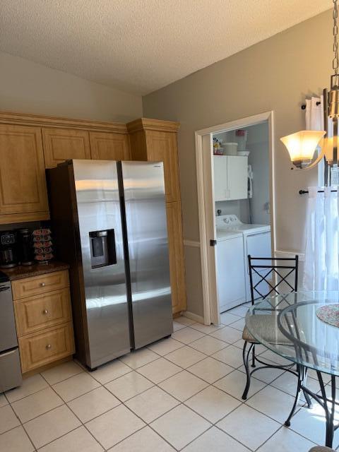 8025 Whispering Palm Drive Boca Raton, FL 33496 - Photo 5 of 27 a kitchen with stainless steel appliances a refrigerator and a sink