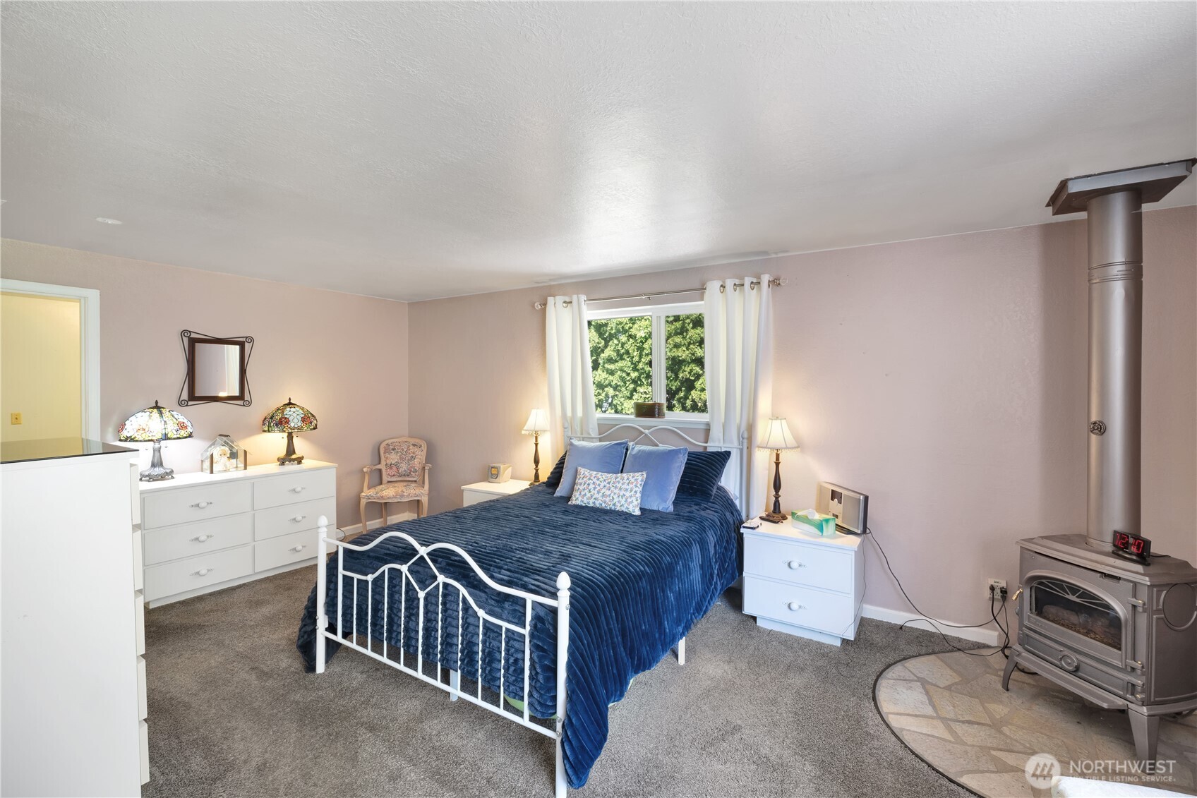 10208 28th Avenue Southwest Seattle, WA 98146 - Photo 7 of 17 a living room with furniture and a window