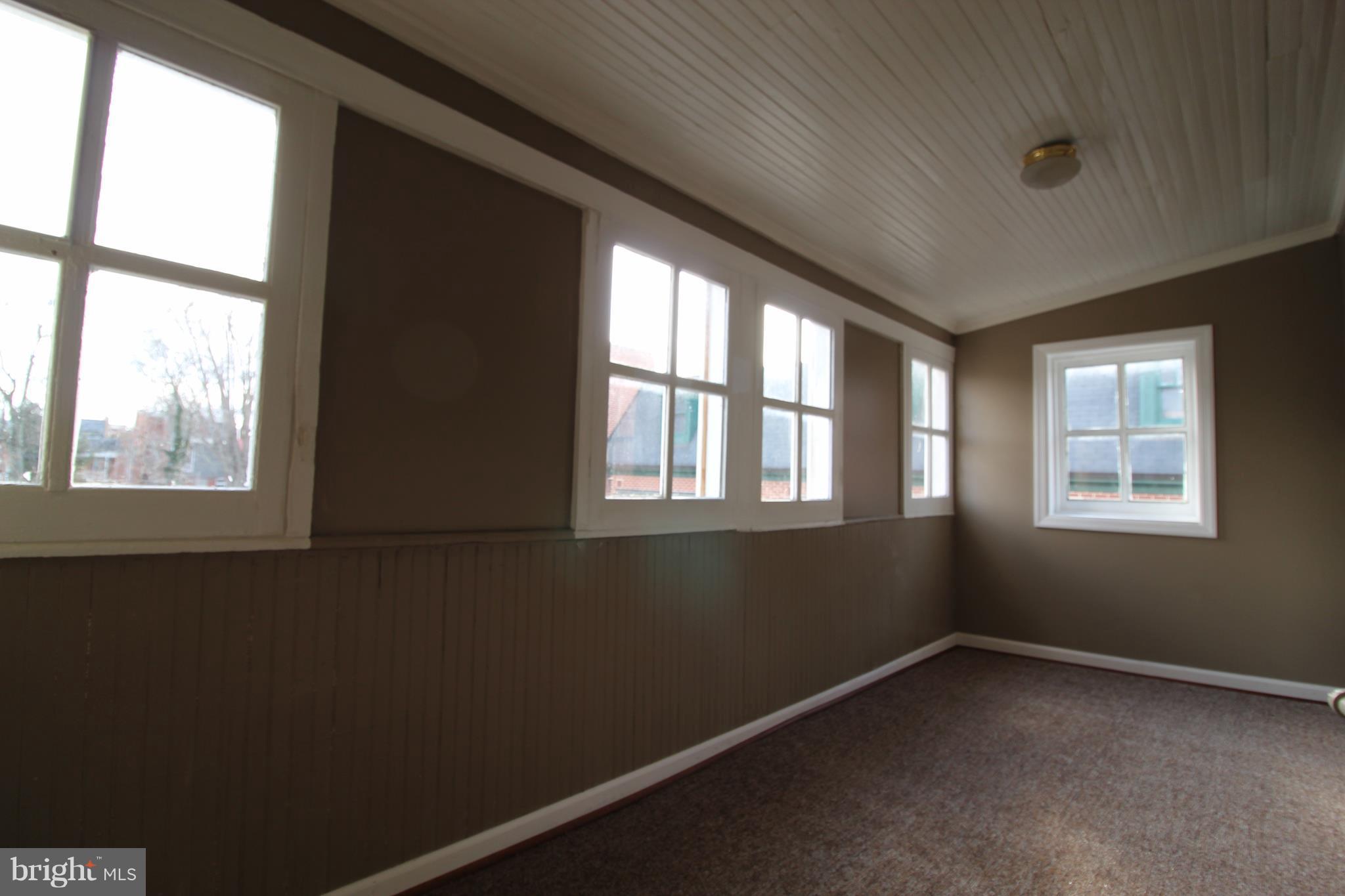 8 West 4th Street Frederick, MD 21701 - Photo 12 of 19 Enclosed porch off master - tons of natural light