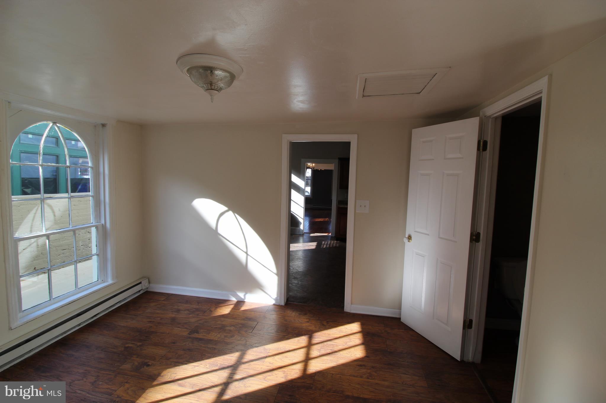 8 West 4th Street Frederick, MD 21701 - Photo 7 of 19 Family room off Kitchen with 1/2 ba and W/D hookup