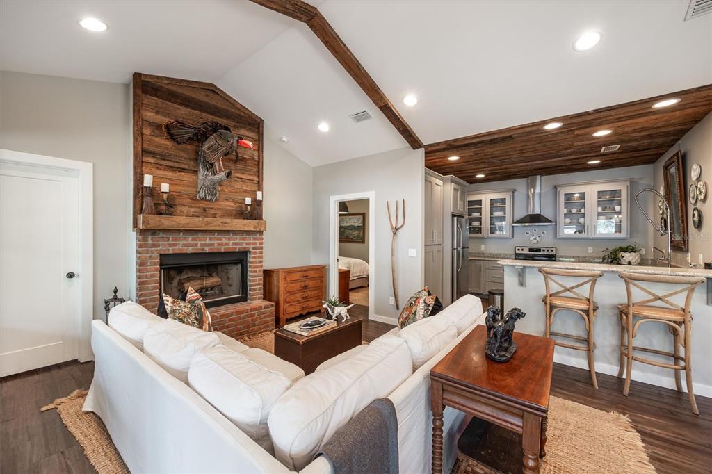 1412 Baden Powell Road Hawthorne, FL 32640 - Photo 8 of 48 a living room with furniture and a fireplace