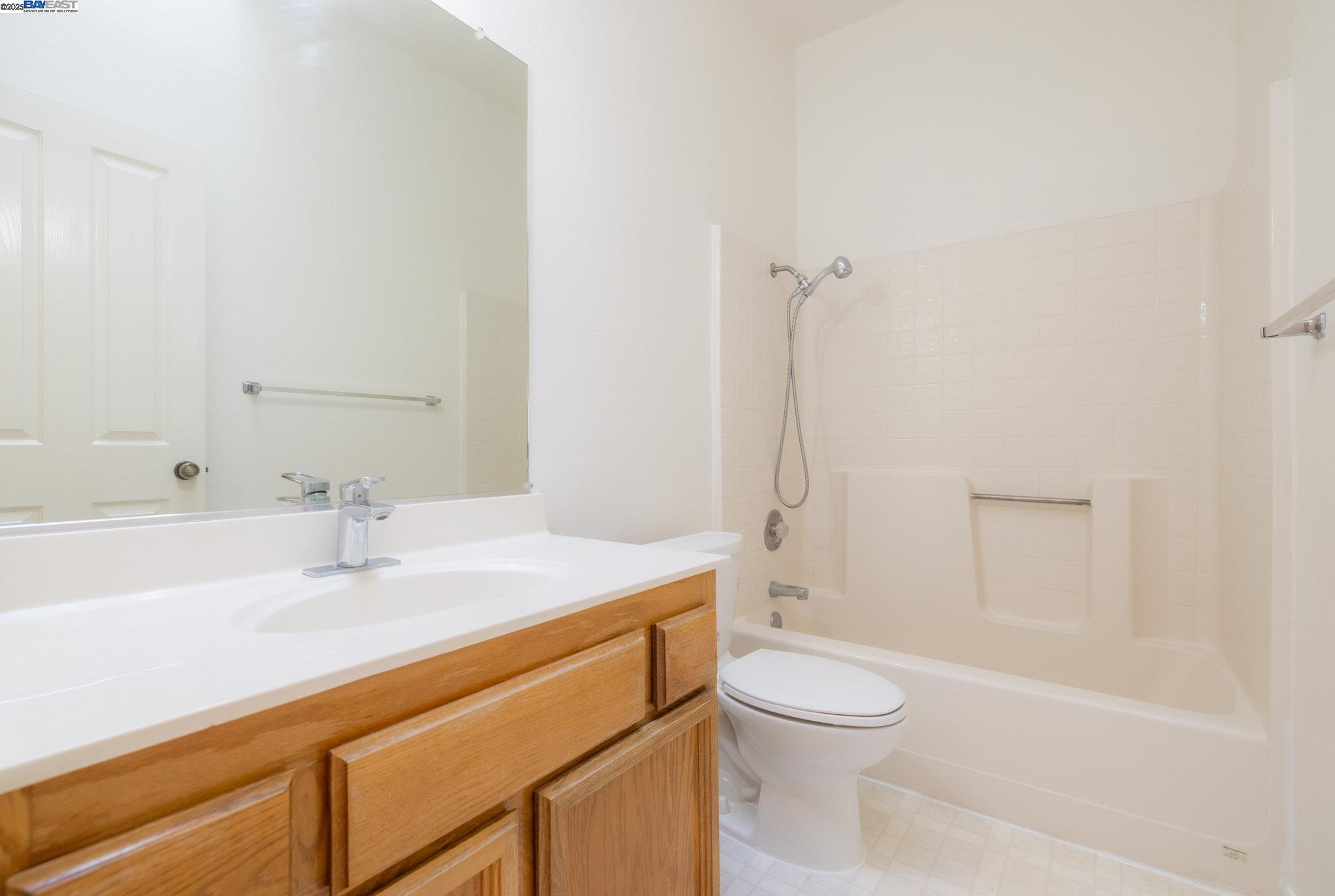 123 Pelican Loop Pittsburg, CA 94565 - Photo 37 of 60 a bathroom with a sink a toilet and shower