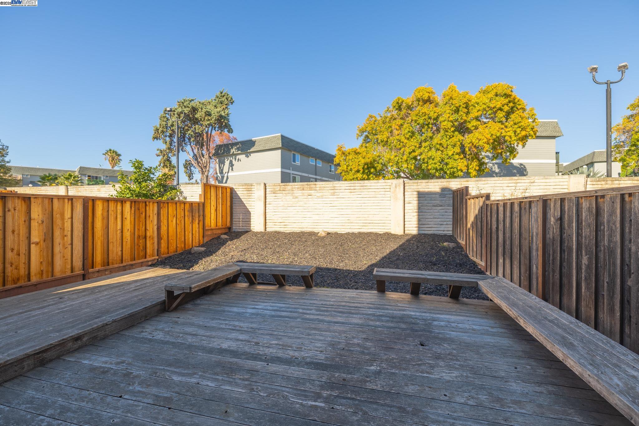 123 Pelican Loop Pittsburg, CA 94565 - Photo 40 of 60 a view of a terrace with a bench