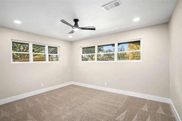 a view of backyard with green space