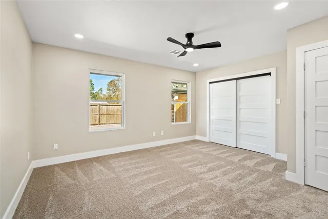 a view of a backyard with a house