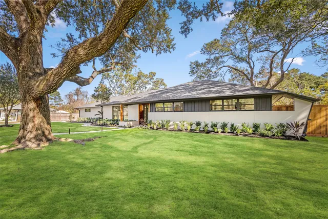a view of a backyard with a garden