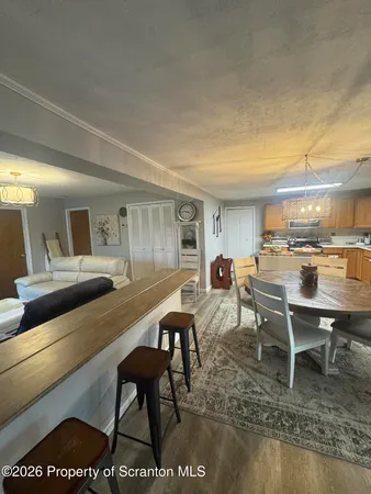 a living room with furniture and a table