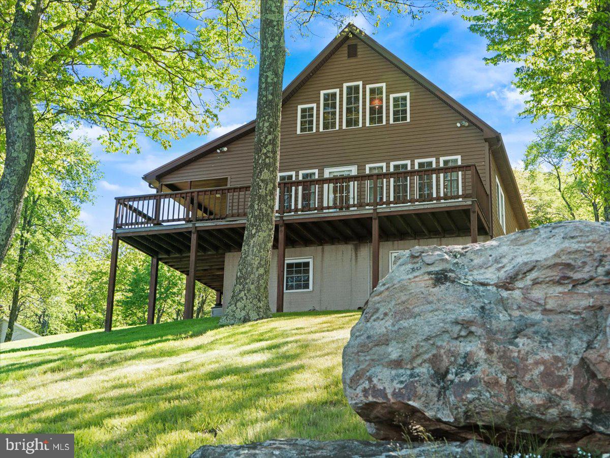 663 Bear Woods Road Mount Storm, WV 26739 - Photo 3 of 73 Charming retreat nestled in nature.