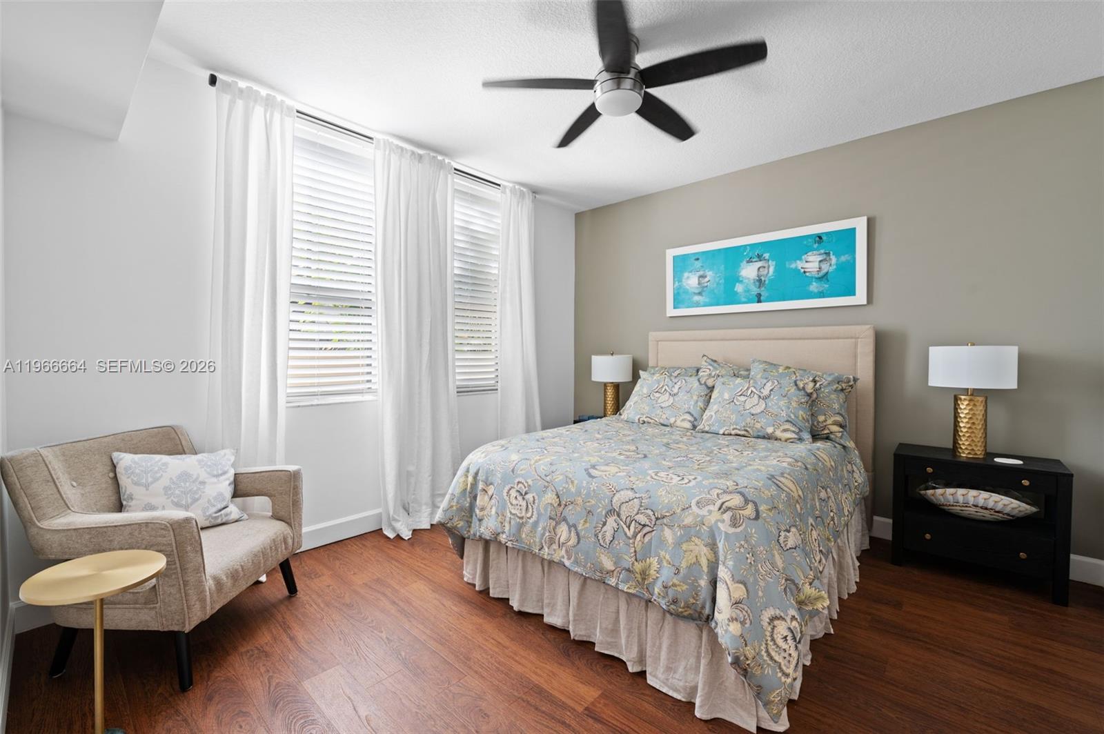 55 Merrick Way, Unit 507 Coral Gables, FL 33134 - Photo 11 of 28 a bedroom with a bed and a couch