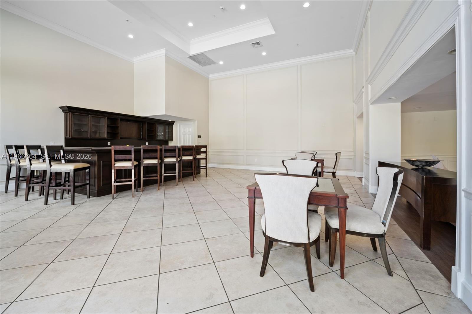 55 Merrick Way, Unit 507 Coral Gables, FL 33134 - Photo 21 of 28 a view of a dining room with furniture
