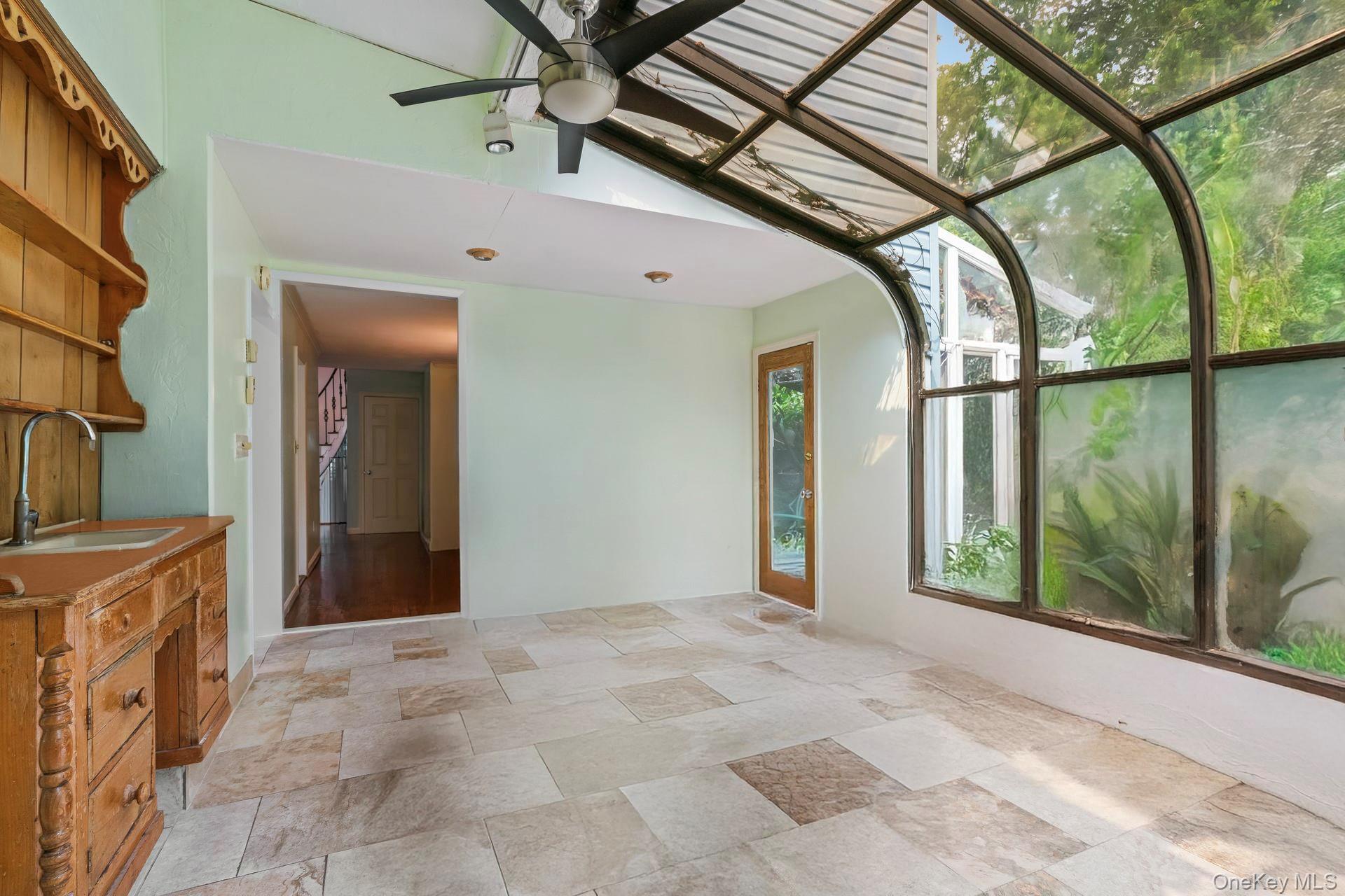 13 Whitney Circle Glen Cove, NY 11542 - Photo 13 of 44 Unfurnished sunroom with a sink