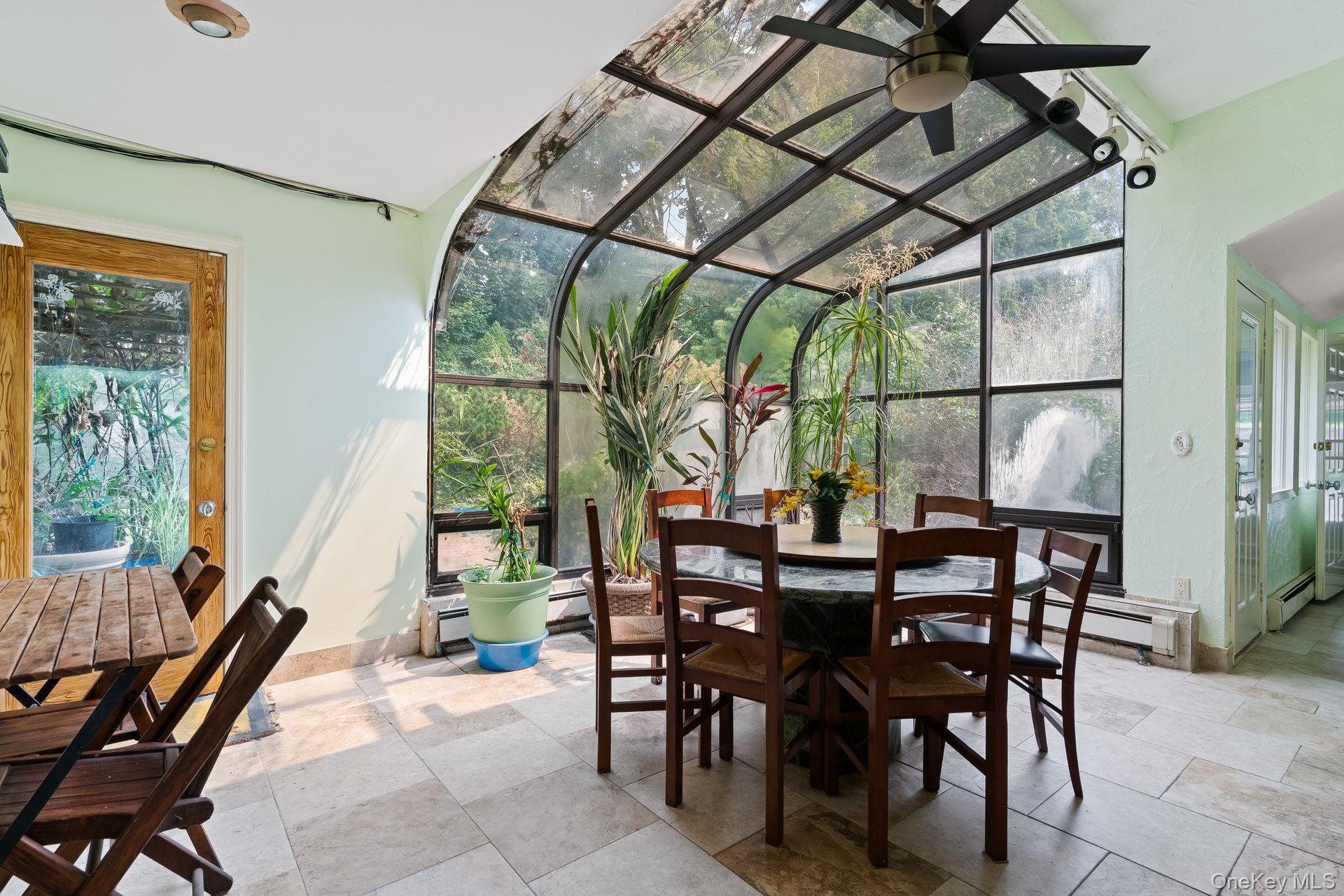 13 Whitney Circle Glen Cove, NY 11542 - Photo 15 of 44 a view of a dining room with furniture window and outside view