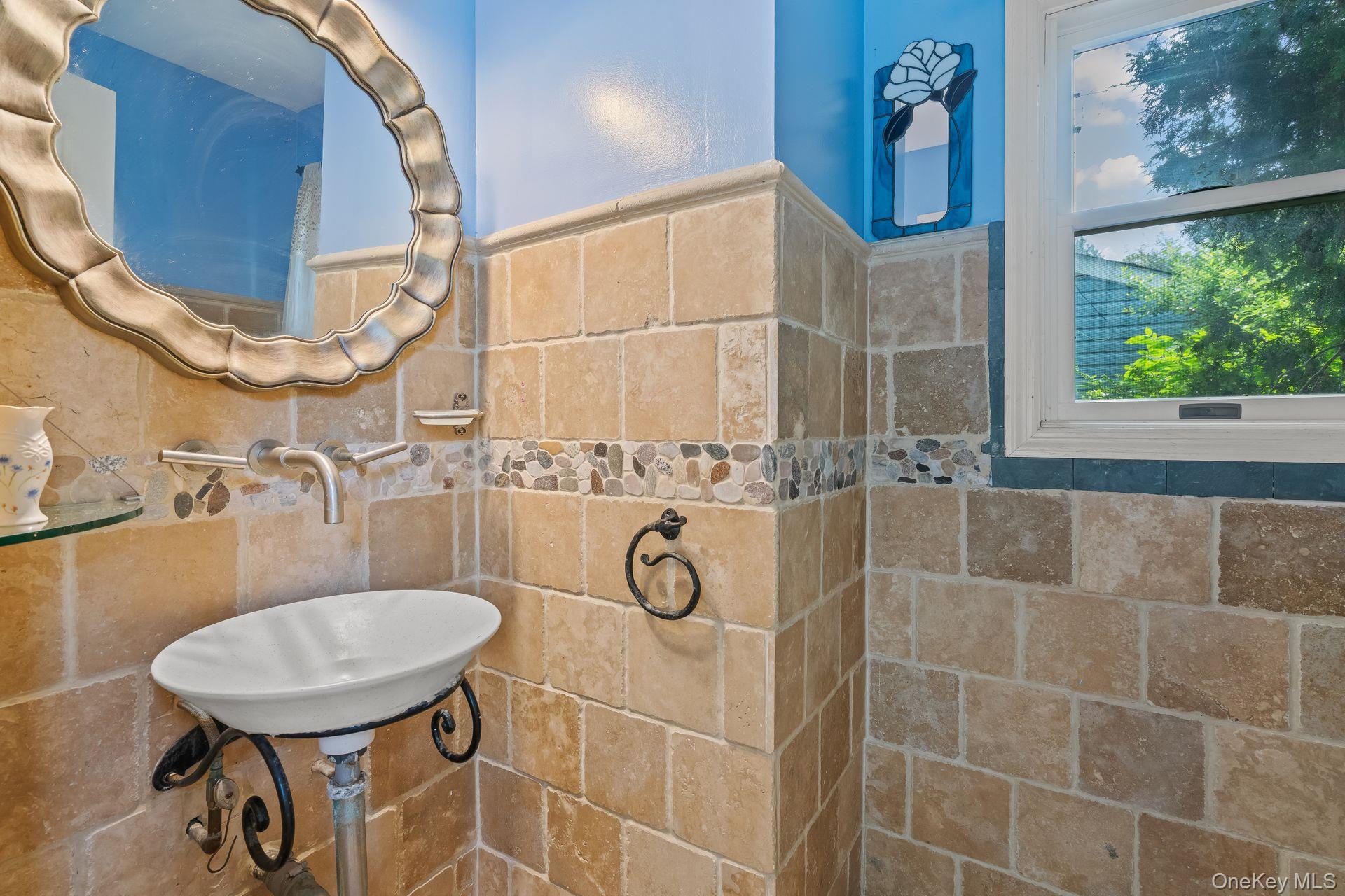 13 Whitney Circle Glen Cove, NY 11542 - Photo 18 of 44 Bathroom with a sink and tile walls