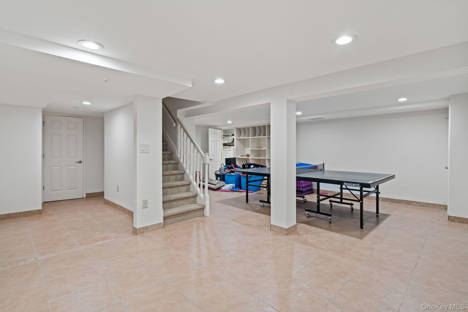 13 Whitney Circle Glen Cove, NY 11542 - Photo 28 of 44 an empty room with furniture and white walls