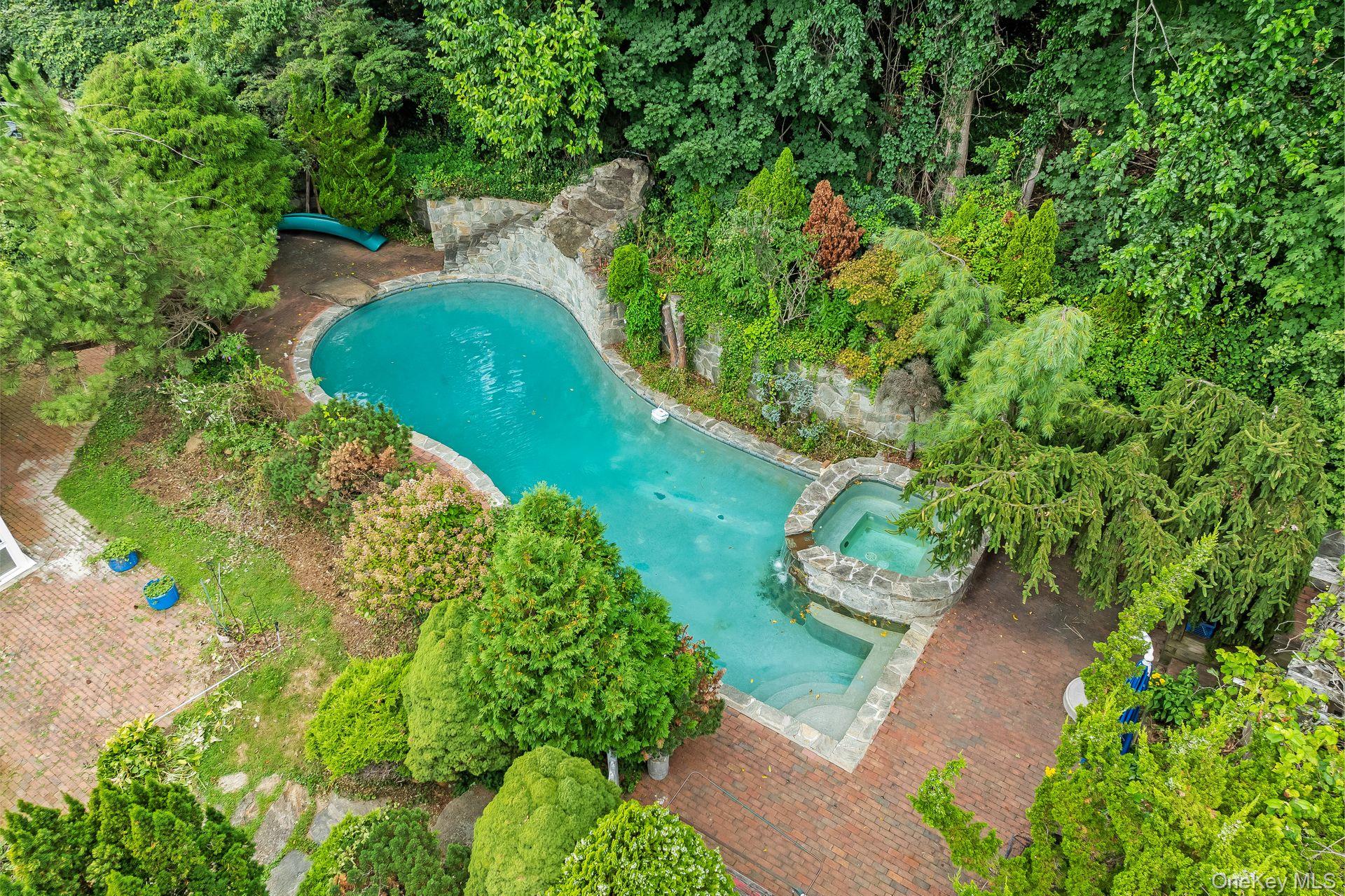 13 Whitney Circle Glen Cove, NY 11542 - Photo 30 of 44 an aerial view of a house with a yard and large trees