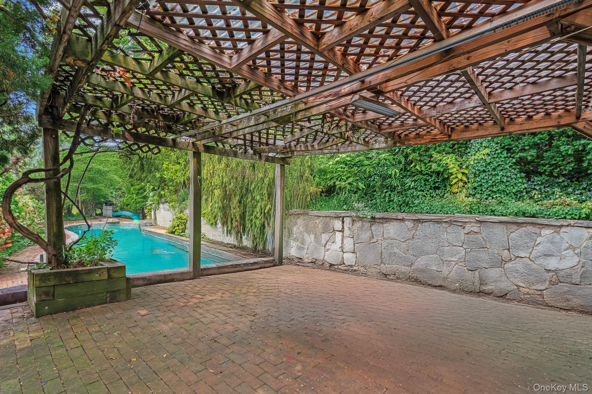 13 Whitney Circle Glen Cove, NY 11542 - Photo 35 of 44 Outdoor pool with a patio area and a pergola