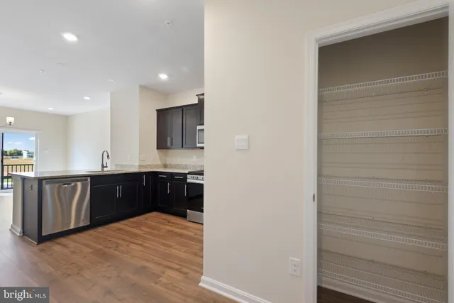 a view of a kitchen and a sink