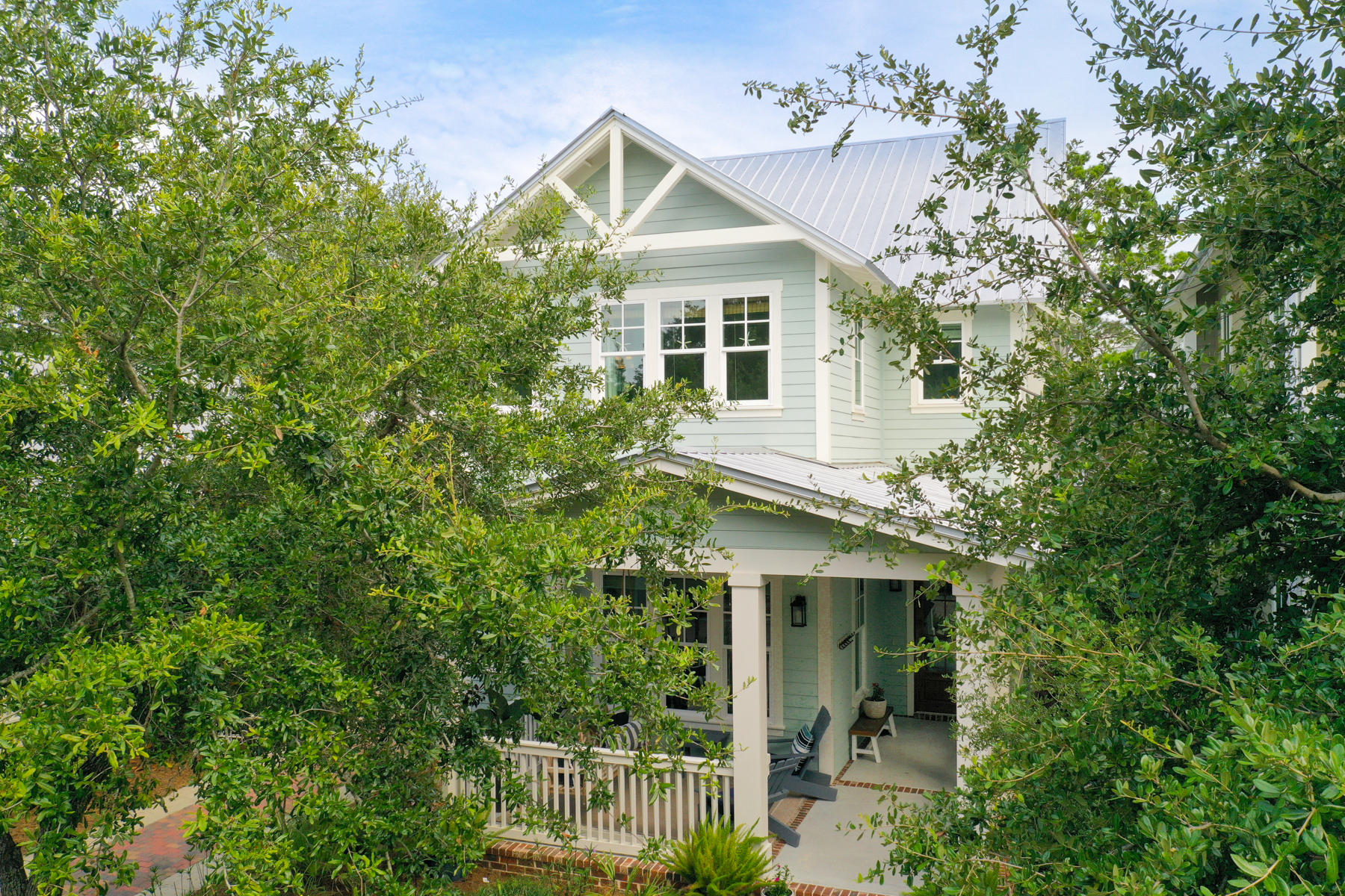 33 Pontchartrain North Santa Rosa Beach, FL 32459 - Photo 5 of 49 a view of a house with potted plants and large tree
