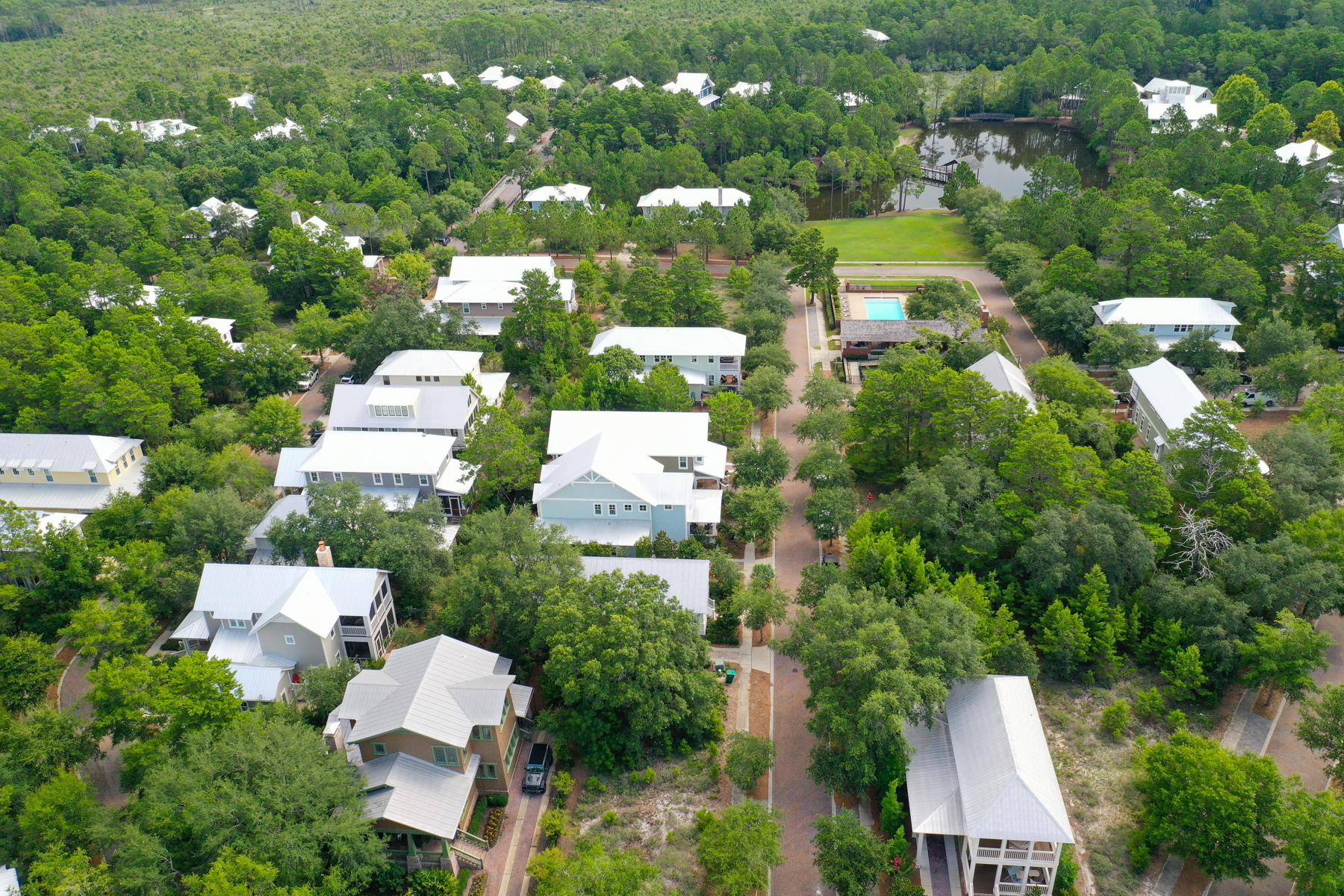 33 Pontchartrain North Santa Rosa Beach, FL 32459 - Photo 44 of 49 an aerial view of a house with swimming pool and outdoor seating