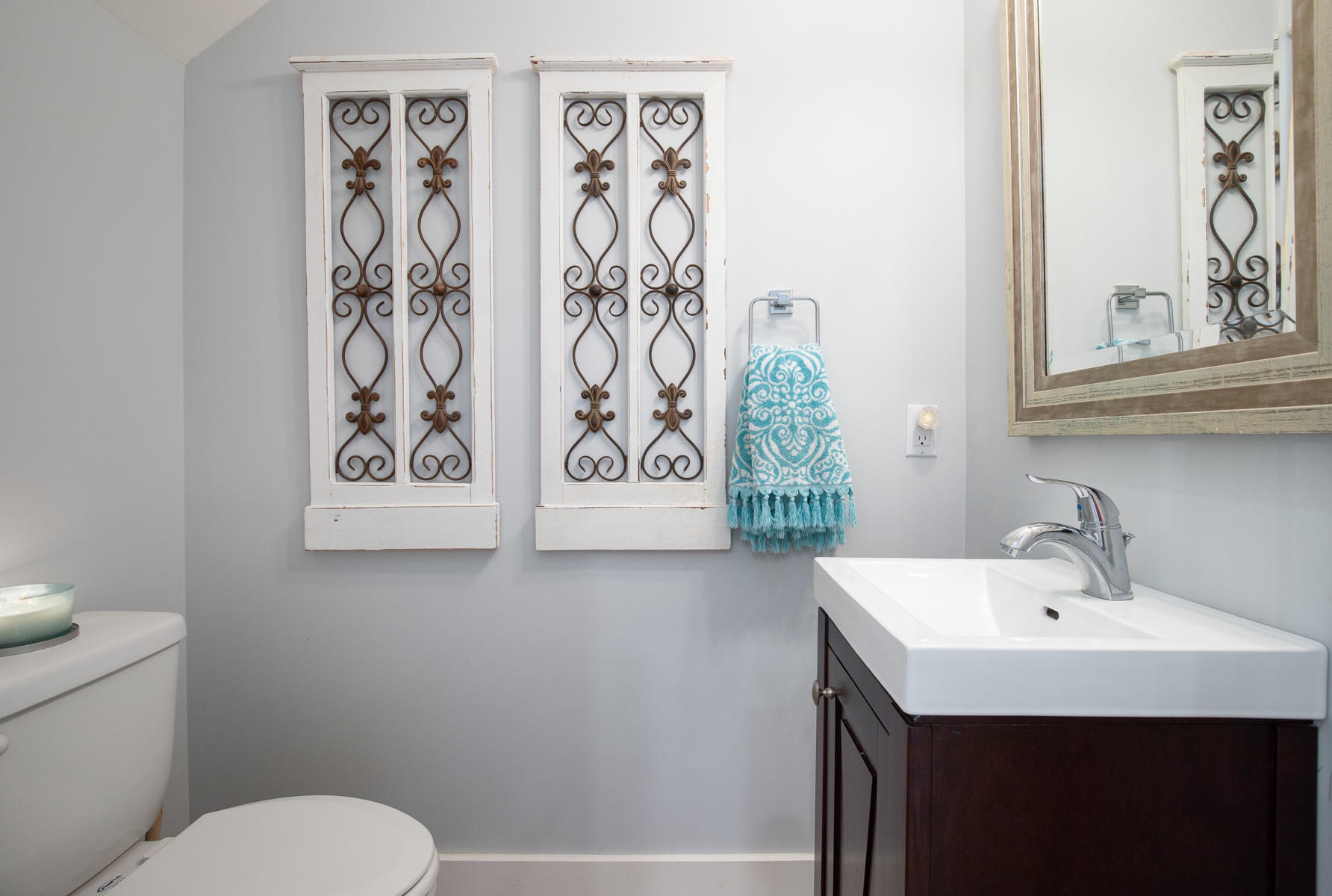 33 Pontchartrain North Santa Rosa Beach, FL 32459 - Photo 9 of 49 a bathroom with a toilet sink and mirror