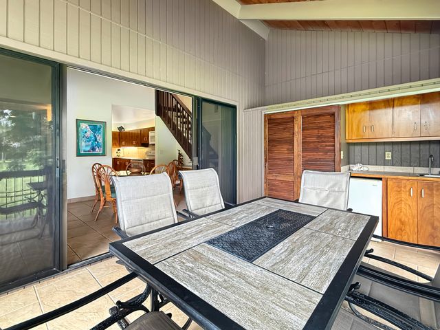 a living room with couch and a table