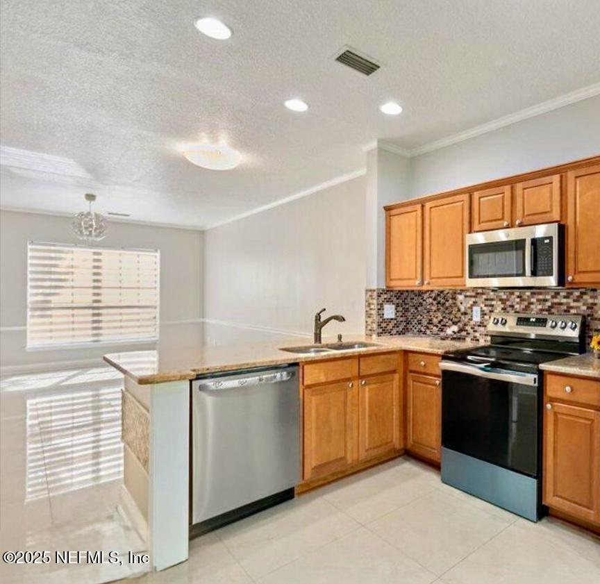 3502 Summerlin Lane North Jacksonville, FL 32224 - Photo 6 of 26 Kitchen/Breakfast Bar