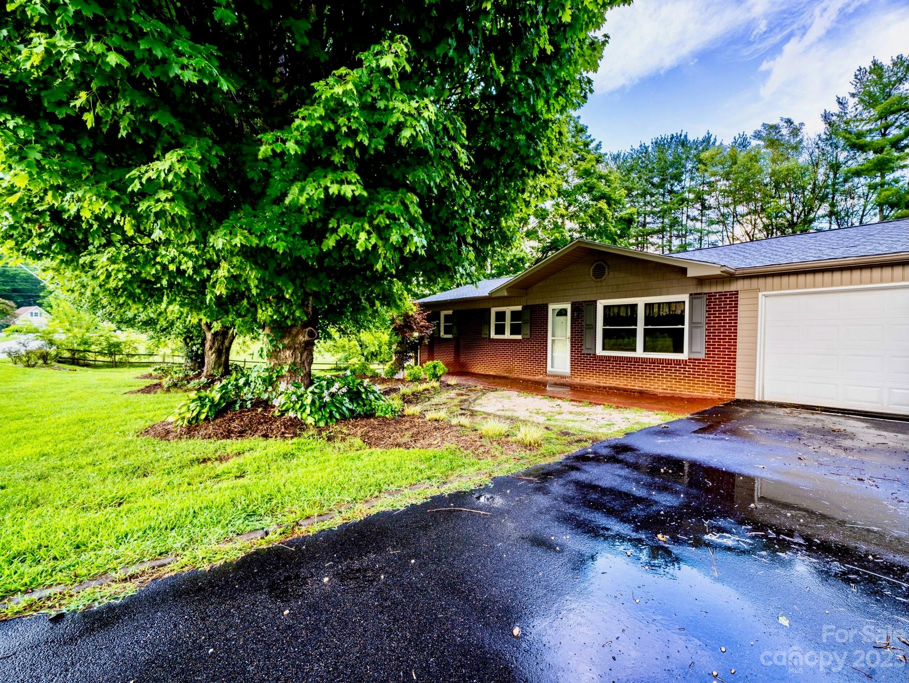309 Sheldon Street Hudson, NC 28638 - Photo 1 of 40 a house with swimming pool in front of it