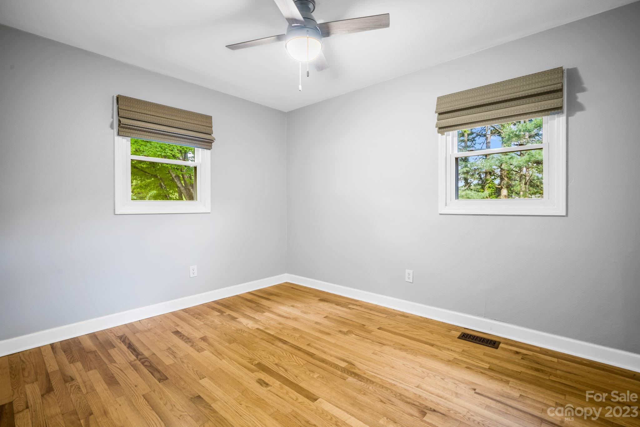 309 Sheldon Street Hudson, NC 28638 - Photo 13 of 40 a view of room with window and ceiling fan