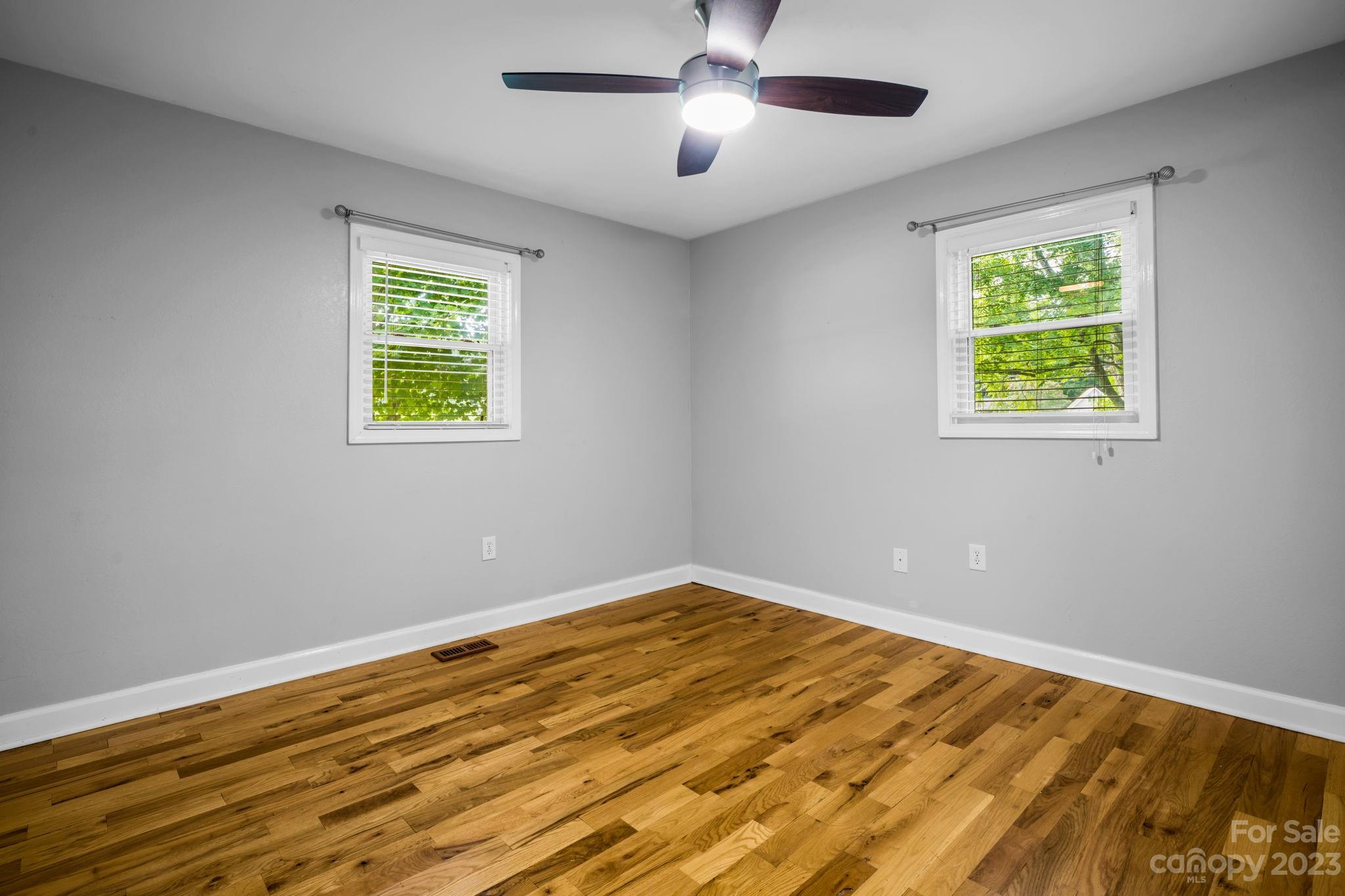 309 Sheldon Street Hudson, NC 28638 - Photo 14 of 40 a view of empty room with window