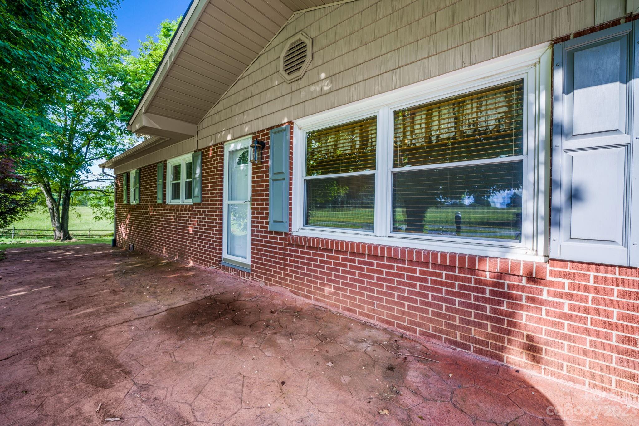 309 Sheldon Street Hudson, NC 28638 - Photo 2 of 40 a view of entrance gate of the house