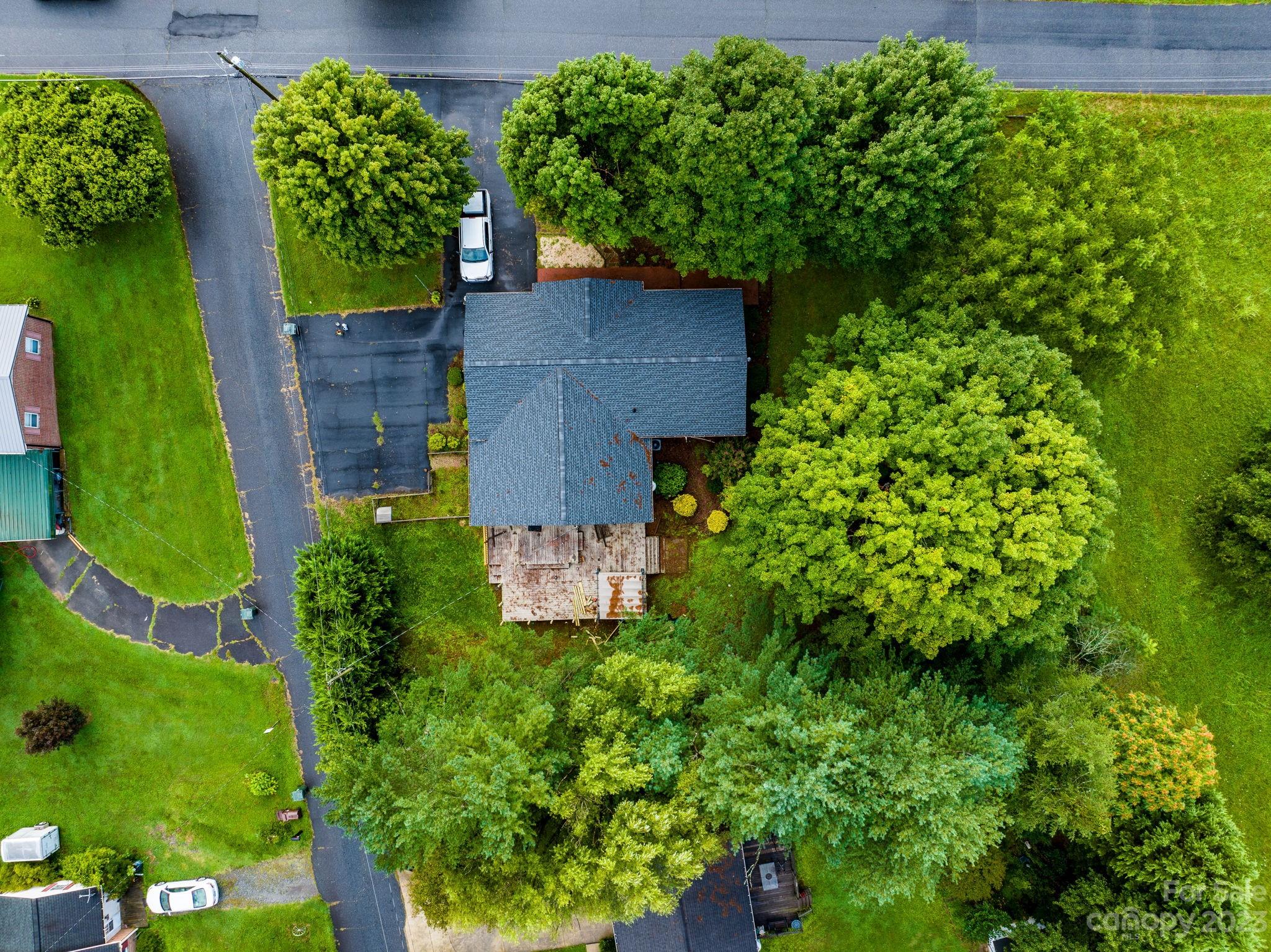 309 Sheldon Street Hudson, NC 28638 - Photo 24 of 40 an aerial view of a house with a yard basket ball court and outdoor seating