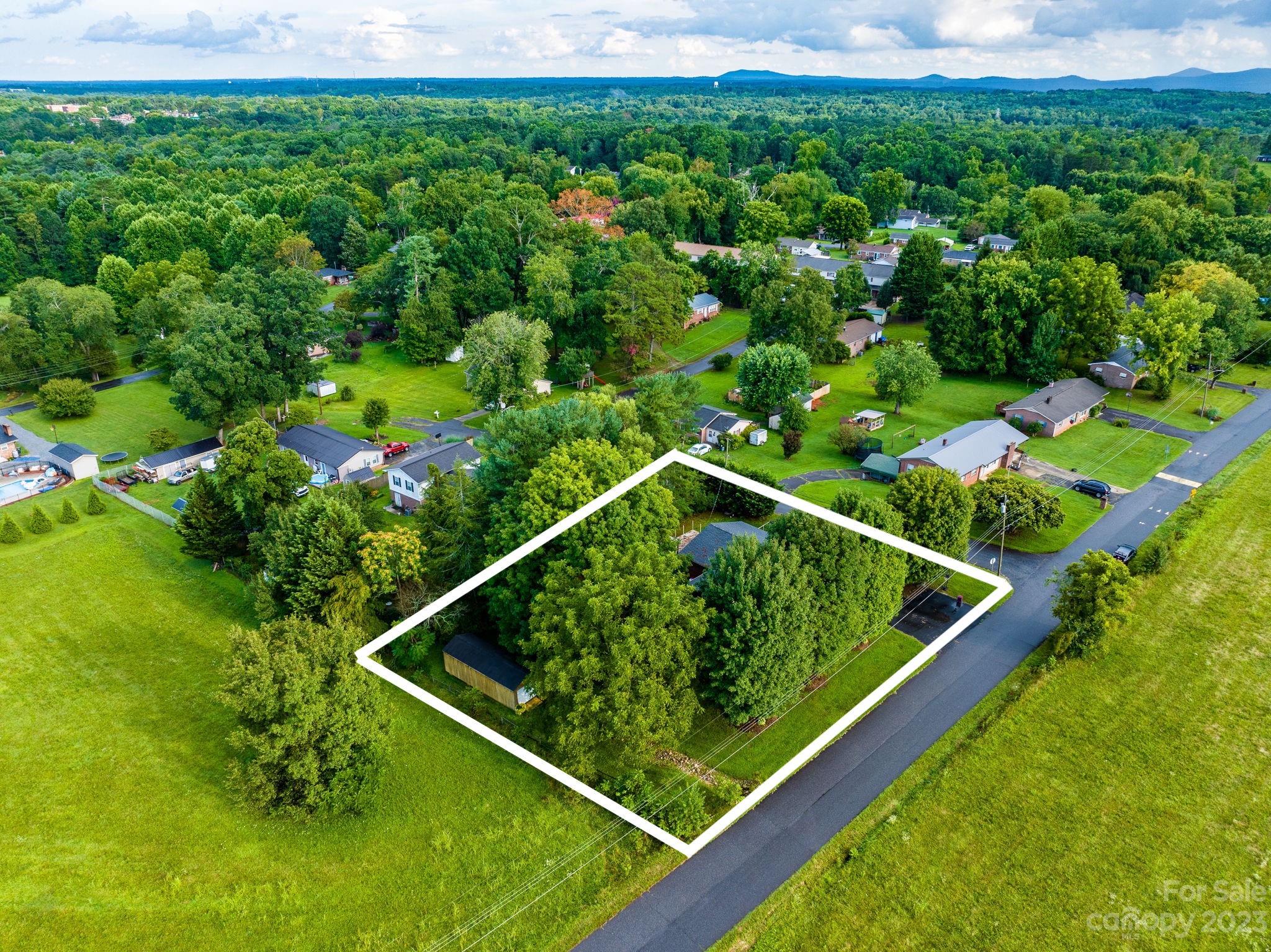 309 Sheldon Street Hudson, NC 28638 - Photo 26 of 40 a view of a small yard