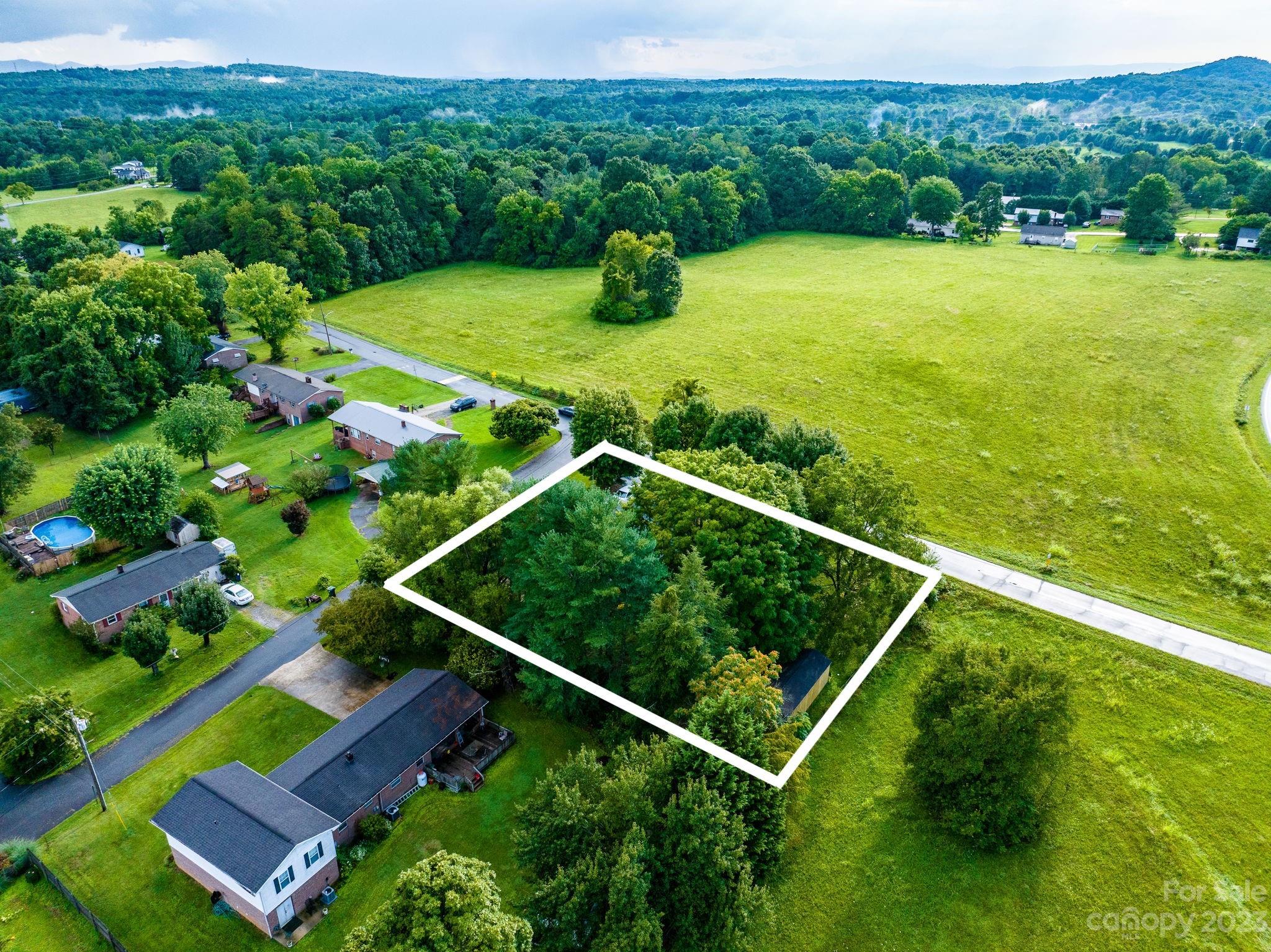 309 Sheldon Street Hudson, NC 28638 - Photo 27 of 40 a view of a tennis court