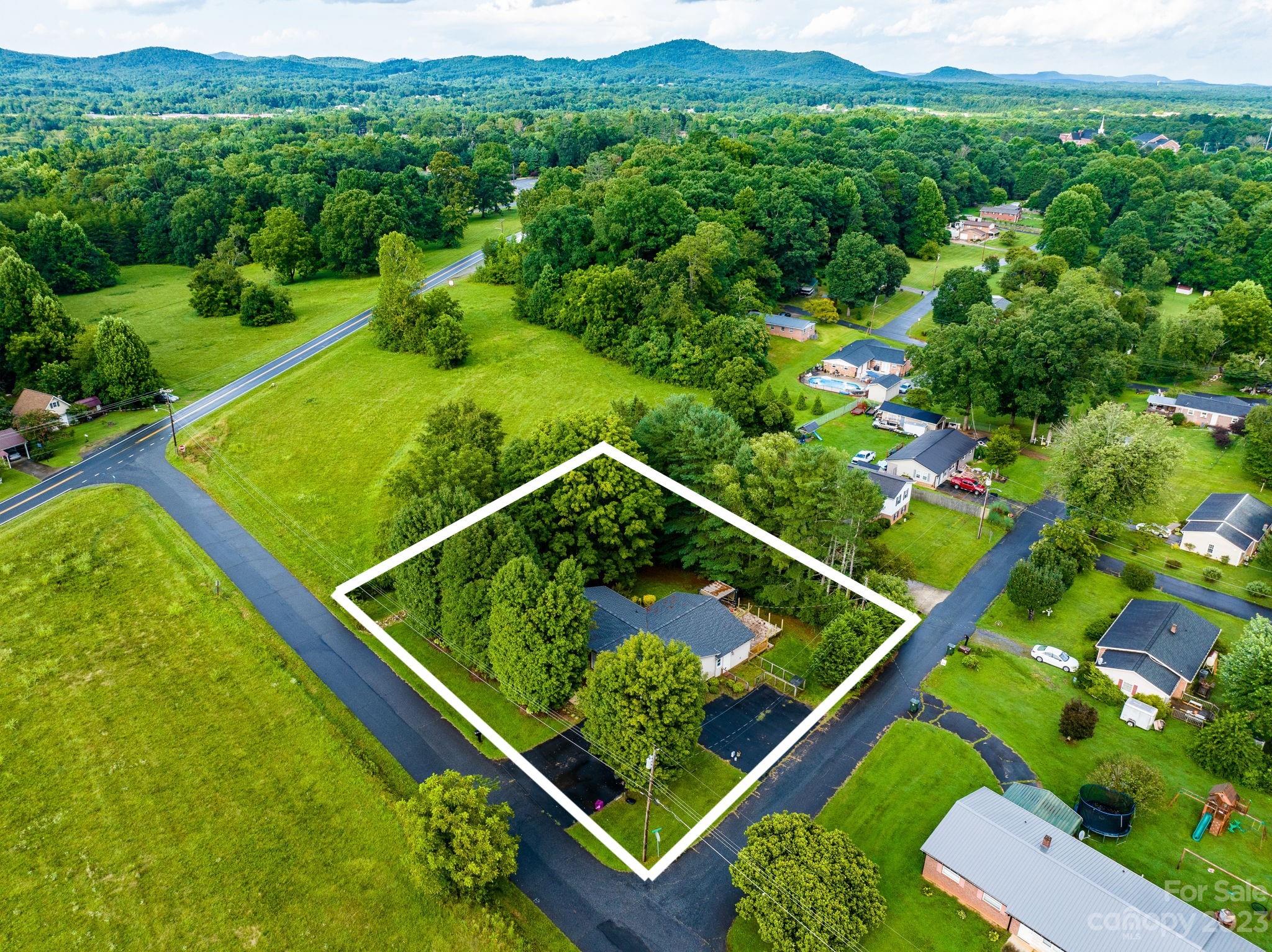309 Sheldon Street Hudson, NC 28638 - Photo 28 of 40 a view of a backyard