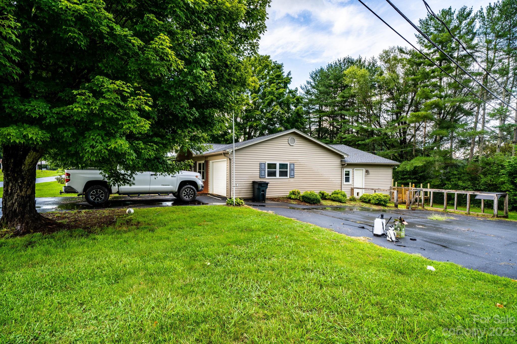 309 Sheldon Street Hudson, NC 28638 - Photo 30 of 40 a house view with a garden space
