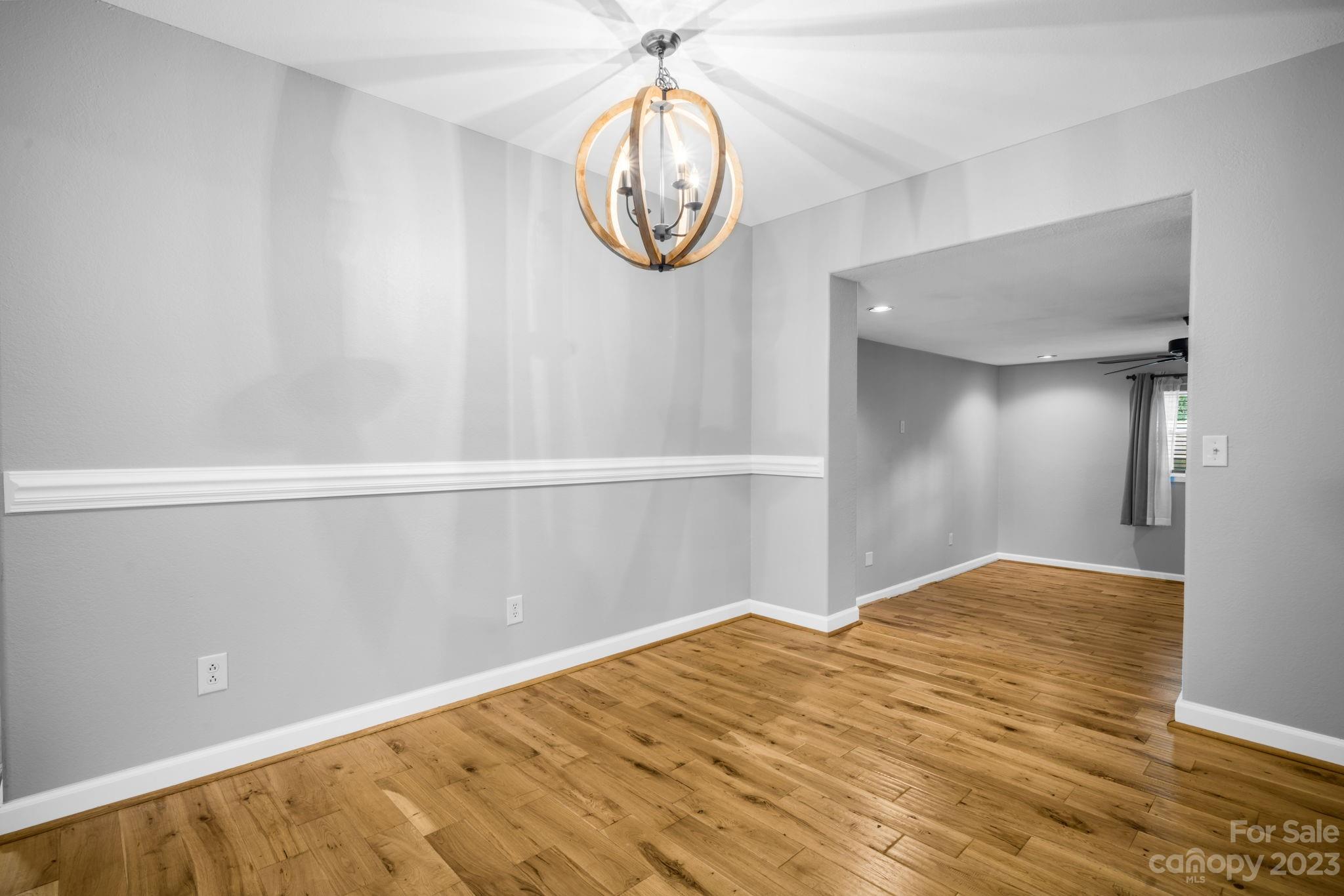 309 Sheldon Street Hudson, NC 28638 - Photo 9 of 40 a view of empty room with wooden floor