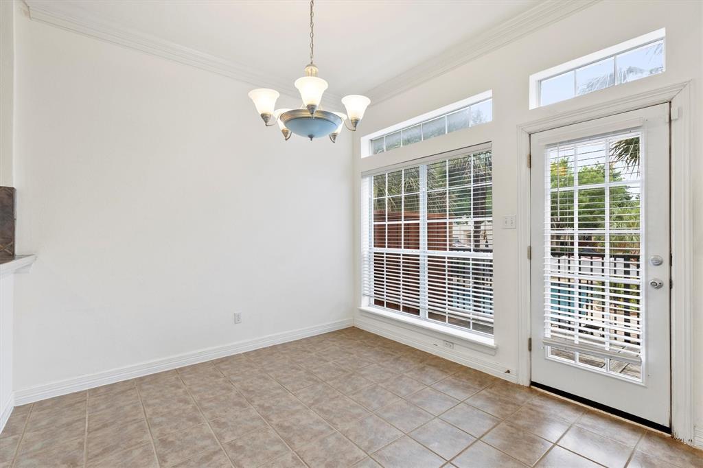 4106 Oberlin Way Addison, TX 75001 - Photo 4 of 17 a view of a livingroom with a chandelier