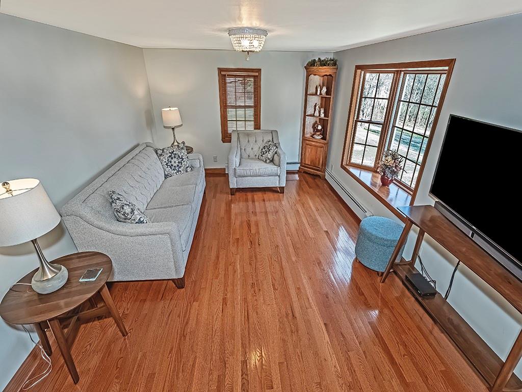 108 Metzler Road Apollo, PA 15613 - Photo 11 of 25 a living room with furniture and a flat screen tv