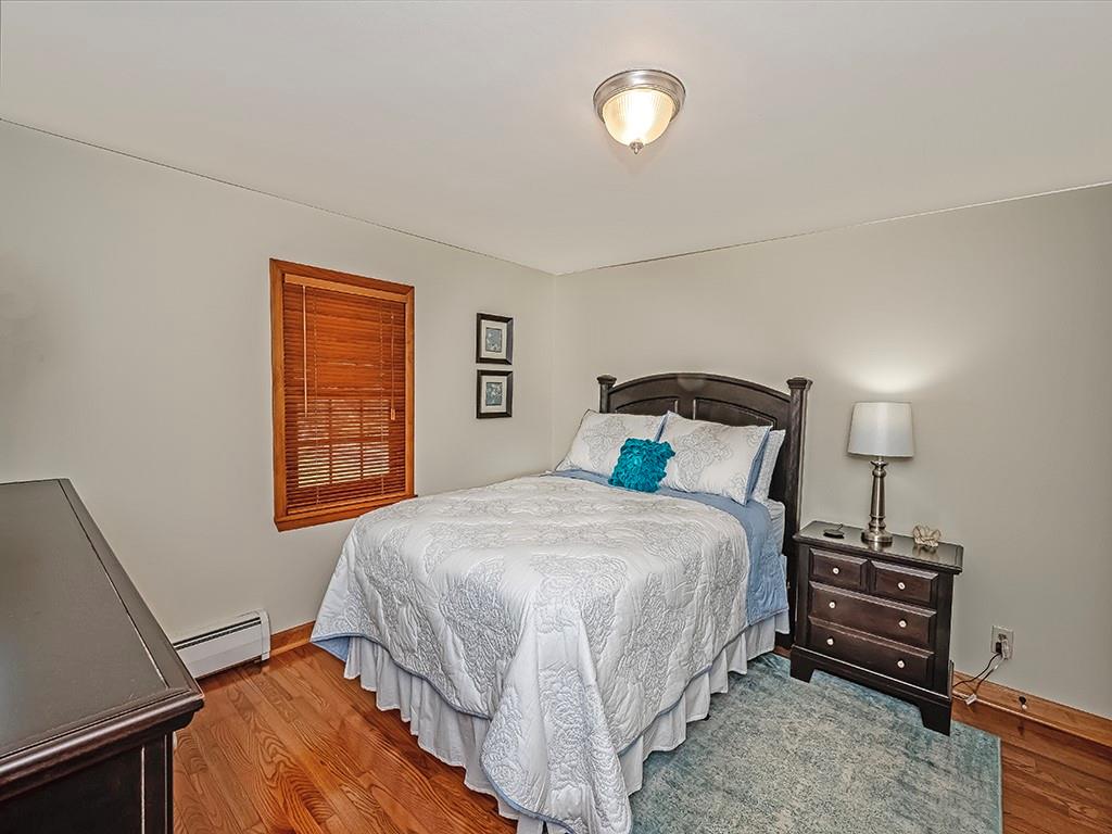 108 Metzler Road Apollo, PA 15613 - Photo 17 of 25 a bedroom with a bed and a window