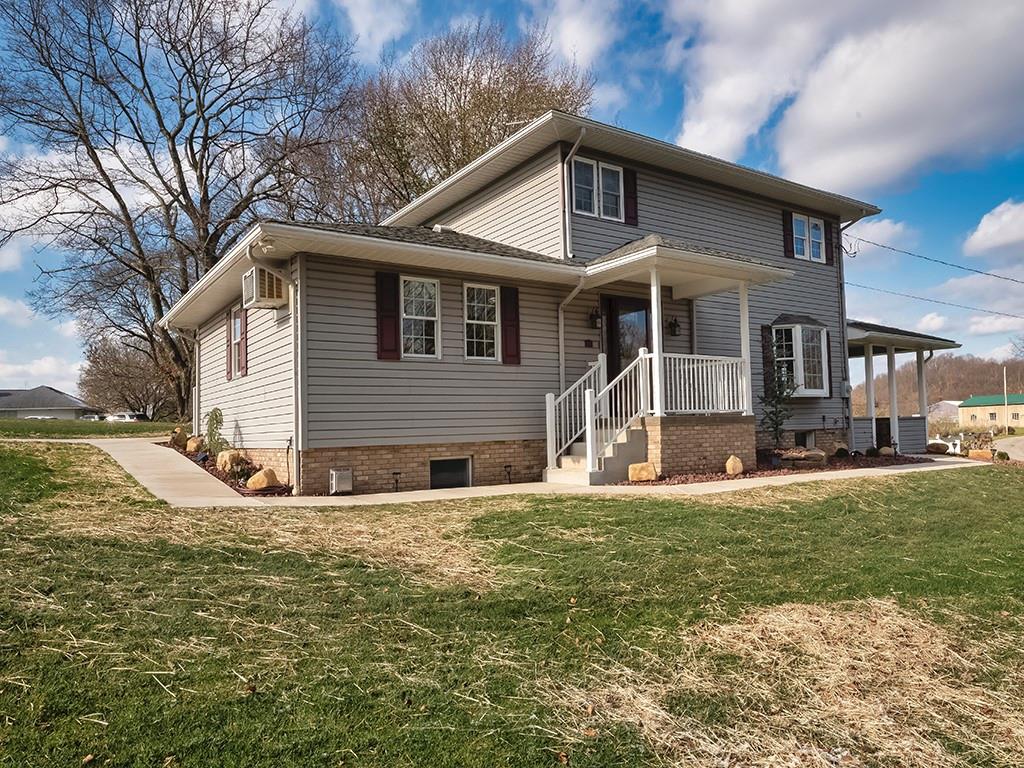 108 Metzler Road Apollo, PA 15613 - Photo 2 of 25 a front view of a house with a yard