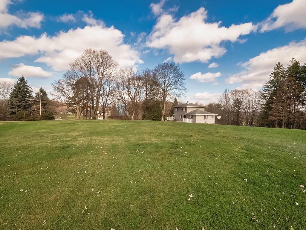 108 Metzler Road Apollo, PA 15613 - Photo 22 of 25 a view of a field with tree in the background