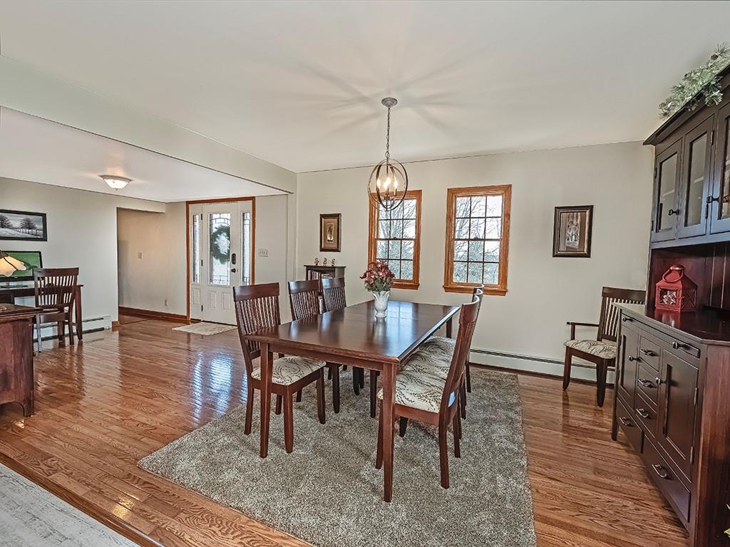 108 Metzler Road Apollo, PA 15613 - Photo 8 of 25 a view of a dining room with furniture window and wooden floor