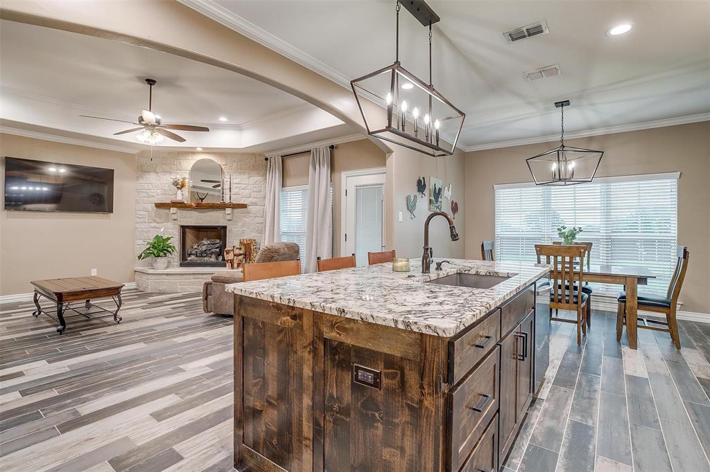 850 McClendon Walker Road Aledo, TX 76008 - Photo 14 of 38 a large kitchen with a table and chairs