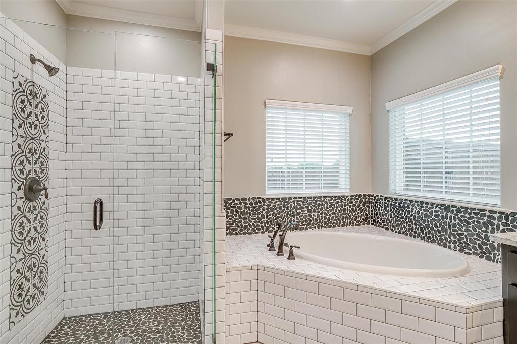 850 McClendon Walker Road Aledo, TX 76008 - Photo 25 of 38 a bathroom with a bathtub and shower
