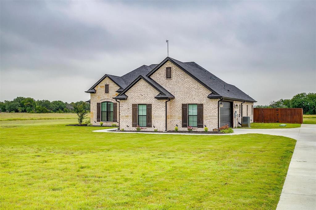850 McClendon Walker Road Aledo, TX 76008 - Photo 3 of 38 a view of a house with a yard