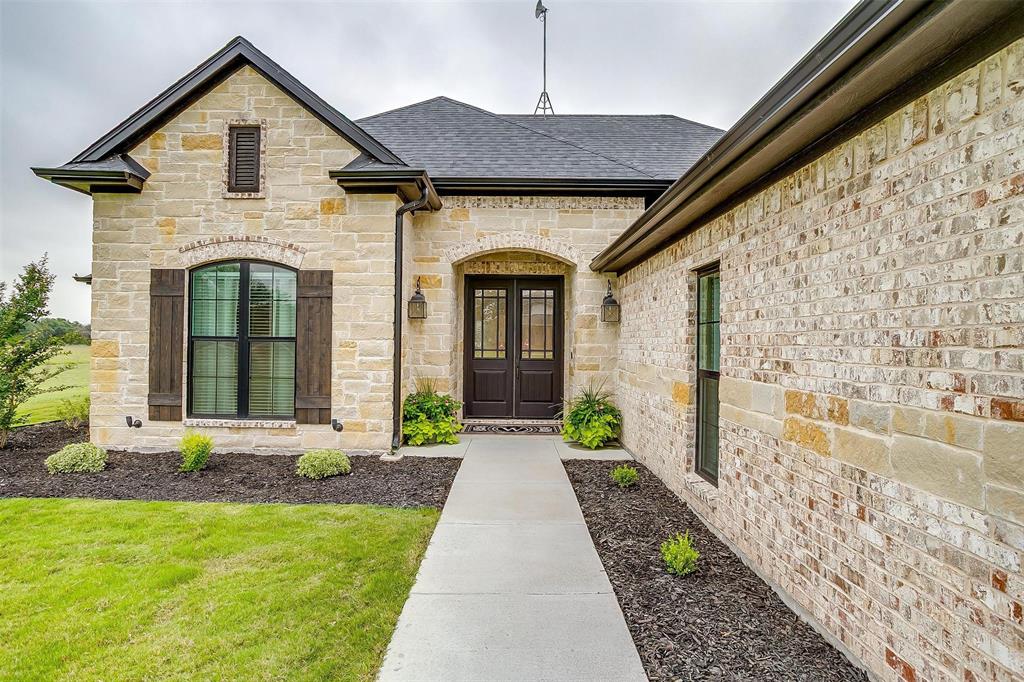 850 McClendon Walker Road Aledo, TX 76008 - Photo 5 of 38 a front view of a house with a yard
