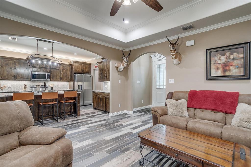 850 McClendon Walker Road Aledo, TX 76008 - Photo 9 of 38 a living room with lots of furniture and view of kitchen