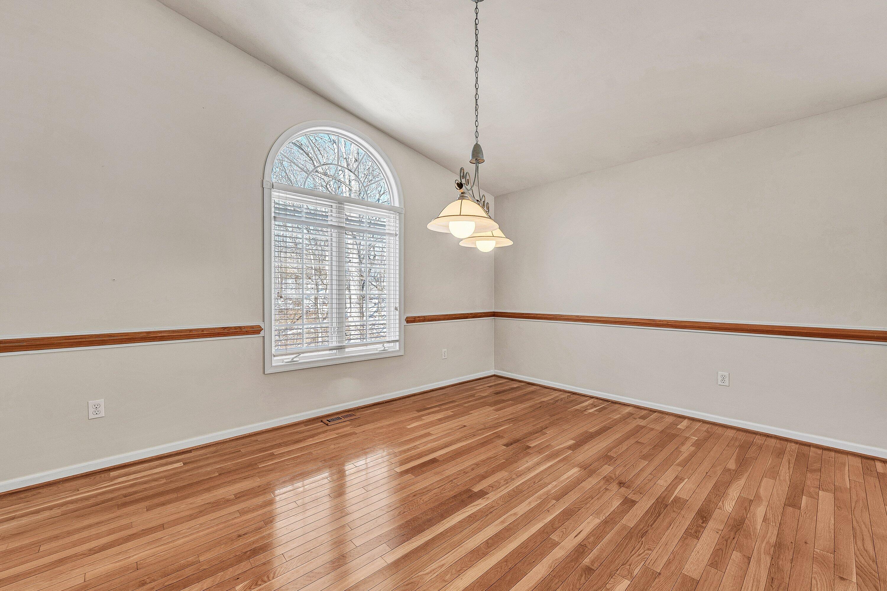 25 Walnut Landing Circle Hardy, VA 24101 - Photo 17 of 56 a view of empty room with wooden floor and fan