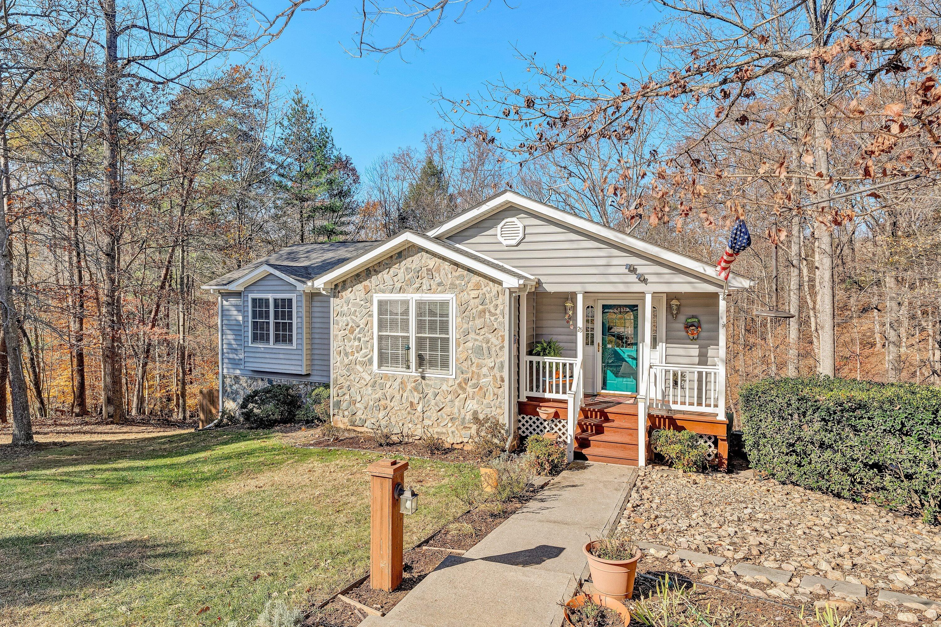 25 Walnut Landing Circle Hardy, VA 24101 - Photo 3 of 56 a front view of a house with a yard