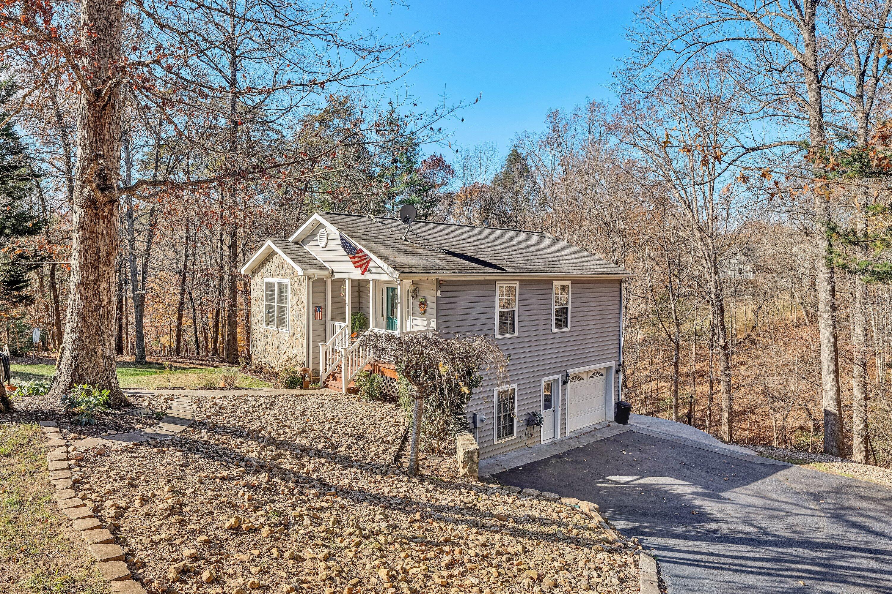 25 Walnut Landing Circle Hardy, VA 24101 - Photo 5 of 56 a view of a house with a yard